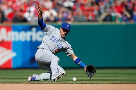 Apr 6, 2017; St. Louis, MO, USA; Chicago Cubs third baseman Javier Baez (9) makes a play against the St. Louis Cardinals during the eighth inning at Busch Stadium. Mandatory Credit: Scott Kane-USA TODAY Sports