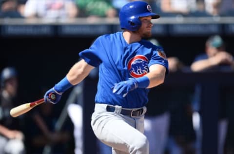 Mar 10, 2017; Peoria, AZ, USA; Chicago Cubs center fielder Ian Happ (86) hits a single against the Seattle Mariners during the second inning at Peoria Stadium. Mandatory Credit: Joe Camporeale-USA TODAY Sports