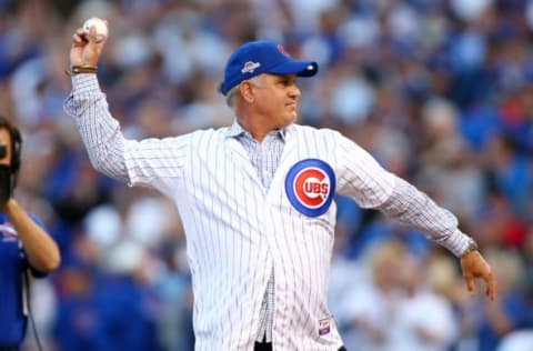 Oct 12, 2015; Chicago, IL, USA; Chicago Cubs hall of fame infielder Ryne Sandberg throws out the ceremonial first pitch before game three of the NLDS between the Chicago Cubs and the St. Louis Cardinals at Wrigley Field. Mandatory Credit: Jerry Lai-USA TODAY Sports