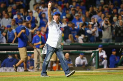 October 20, 2015; Chicago, IL, USA; Chicago Cubs former player Rick Sutcliffe waves to fans before throwing out the ceremonial first pitch in game four of the NLCS at Wrigley Field. Mandatory Credit: Dennis Wierzbicki-USA TODAY Sports