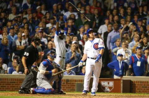 Oct 15, 2016; Chicago, IL, USA; Chicago Cubs pinch hitter Miguel Montero hits a grand slam against the Los Angeles Dodgers during the eighth inning in game one of the 2016 NLCS playoff baseball series at Wrigley Field. Mandatory Credit: Jerry Lai-USA TODAY Sports