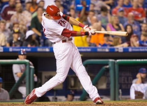 Sep 29, 2015; Philadelphia, PA, USA; Philadelphia Phillies left fielder Aaron Altherr (40) hits an RBI single during the seventh inning against the New York Mets at Citizens Bank Park. The Phillies won 4-3. Mandatory Credit: Bill Streicher-USA TODAY Sports