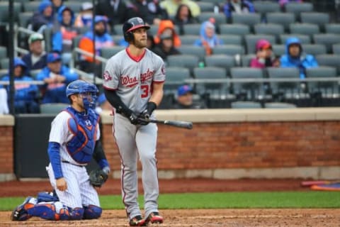 Oct 3, 2015; New York City, NY, USA; Washington Nationals right fielder Bryce Harper (34) watches his home run ball during the eighth inning against the New York Mets at Citi Field. Washington Nationals won 3-1. Mandatory Credit: Anthony Gruppuso-USA TODAY Sports