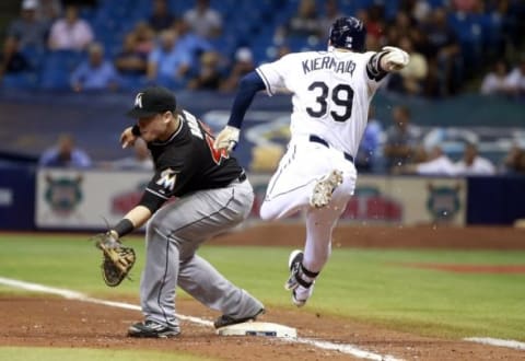 Sep 29, 2015; St. Petersburg, FL, USA; Miami Marlins first baseman Justin Bour (48) focus out Tampa Bay Rays center fielder Kevin Kiermaier (39) during the sixth inning at Tropicana Field. Mandatory Credit: Kim Klement-USA TODAY Sports