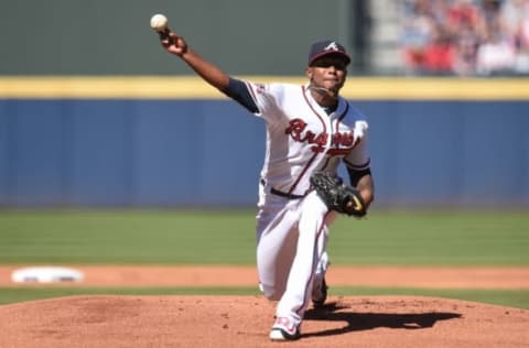 Apr 4, 2016; Atlanta, GA, USA; Atlanta Braves starting pitcher Julio Teheran (49) throws the first pitch of the season against the Washington Nationals during the first inning at Turner Field. Mandatory Credit: Dale Zanine-USA TODAY Sports