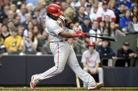 Apr 24, 2016; Milwaukee, WI, USA; Philadelphia Phillies third baseman Maikel Franco (7) drives in a run with a base hit in the third inning against the Milwaukee Brewers at Miller Park. Mandatory Credit: Benny Sieu-USA TODAY Sports