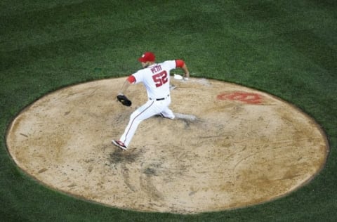 Apr 7, 2016; Washington, DC, USA; Washington Nationals relief pitcher Yusmeiro Petit (52) throws the ball against the Miami Marlins during the sixth inning at Nationals Park. Mandatory Credit: Brad Mills-USA TODAY Sports