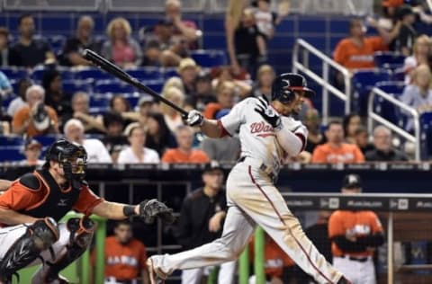 May 22, 2016; Miami, FL, USA; Washington Nationals left fielder Ben Revere (9) connects for an RBI double during the sixth inning against the Miami Marlins at Marlins Park. The Nationals won 8-2. Mandatory Credit: Steve Mitchell-USA TODAY Sports