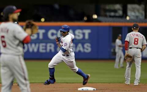 May 17, 2016; New York City, NY, USA; New York Mets right fielder Curtis Granderson (3) rounds the bases after hitting a solo home run against the Washington Nationals during the first inning at Citi Field. Mandatory Credit: Adam Hunger-USA TODAY Sports