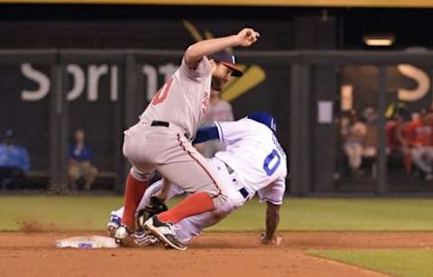 May 3, 2016; Kansas City, MO, USA; Washington Nationals second baseman Daniel Murphy (20) cannot make the tag as Kansas City Royals outfielder Terrence Gore (0) steals second base in the ninth inning against the Washington Nationals at Kauffman Stadium. The Royals won 7-6. Mandatory Credit: Denny Medley-USA TODAY Sports