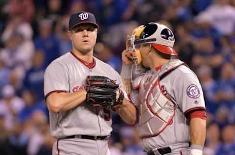 May 3, 2016; Kansas City, MO, USA; Washington Nationals catcher Wilson Ramos (40) talks with relief pitcher Jonathan Papelbon (58) at the mound in the ninth inning against the Kansas City Royals at Kauffman Stadium. The Royals won 7-6. Mandatory Credit: Denny Medley-USA TODAY Sports