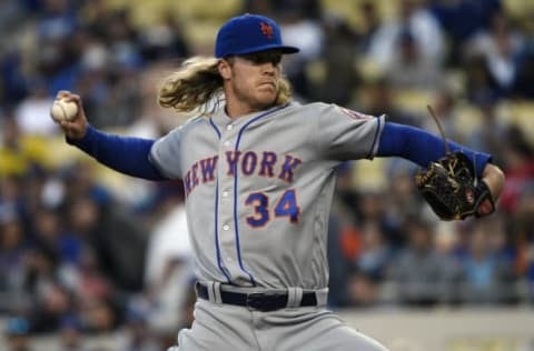 May 11, 2016; Los Angeles, CA, USA; New York Mets starting pitcher Noah Syndergaard (34) pitches against the Los Angeles Dodgers during the first inning at Dodger Stadium. Mandatory Credit: Kelvin Kuo-USA TODAY Sports