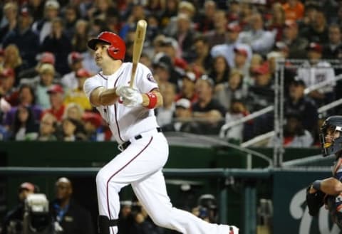 May 10, 2016; Washington, DC, USA; Washington Nationals first baseman Ryan Zimmerman (11) hits a two run home run against the Detroit Tigers during the fifth inning at Nationals Park. Mandatory Credit: Brad Mills-USA TODAY Sports