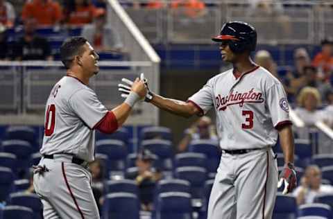 May 20, 2016; Miami, FL, USA; Washington Nationals center fielder Michael Taylor (right) celebrates with Nationals catcher Wilson Ramos (left) after Taylor drove in Ramos on a two run home run against the Miami Marlins during the second inning at Marlins Park. Mandatory Credit: Steve Mitchell-USA TODAY Sports