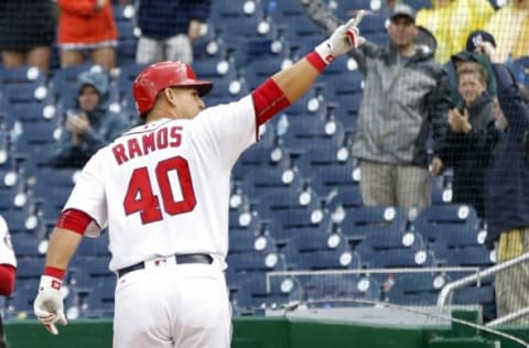 May 14, 2016; Washington, DC, USA; Washington Nationals catcher Wilson Ramos (40) gestures to the stands after hitting a home run against the Miami Marlins in the sixth inning at Nationals Park. The Nationals won 6-4. Mandatory Credit: Geoff Burke-USA TODAY Sports