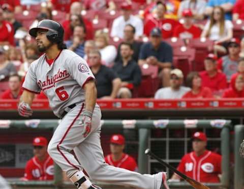 Jun 4, 2016; Cincinnati, OH, USA; Washington Nationals third baseman Anthony Rendon hits a two run home run against the Cincinnati Reds during the second inning at Great American Ball Park. Mandatory Credit: David Kohl-USA TODAY Sports