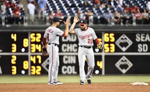 Jun 1, 2016; Philadelphia, PA, USA; Washington Nationals shortstop Danny Espinosa (8) and second baseman Daniel Murphy (20) celebrate win against the Philadelphia Phillies at Citizens Bank Park. The Nationals defeated the Phillies, 7-2. Mandatory Credit: Eric Hartline-USA TODAY Sports