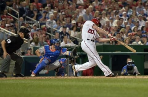 May 24, 2016; Washington, DC, USA; Washington Nationals second baseman Daniel Murphy (20) hits a two-run home run during the fifth inning against the New York Mets at Nationals Park. Mandatory Credit: Tommy Gilligan-USA TODAY Sports