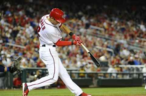 Jul 19, 2016; Washington, DC, USA; Washington Nationals second baseman Trea Turner (7) hits a triple against the Los Angeles Dodgers during the eighth inning at Nationals Park. Mandatory Credit: Brad Mills-USA TODAY Sports