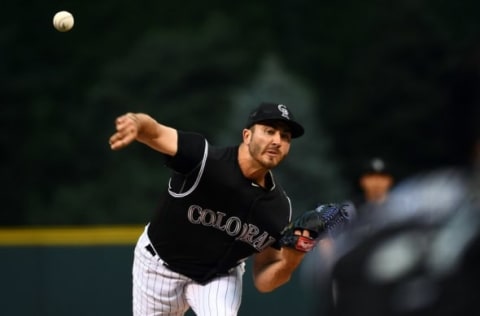 Aug 16, 2016; Denver, CO, USA; Colorado Rockies starting pitcher Chad Bettis (35) delivers a pitch in the first inning against the Washington Nationals at Coors Field. Mandatory Credit: Ron Chenoy-USA TODAY Sports