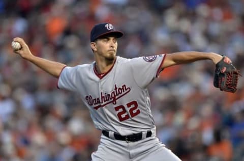 Aug 22, 2016; Baltimore, MD, USA; Washington Nationals starting pitcher A.J. Cole (22) pitches during the second inning against the Baltimore Orioles at Oriole Park at Camden Yards. Mandatory Credit: Tommy Gilligan-USA TODAY Sports