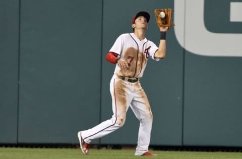 Aug 26, 2016; Washington, DC, USA; Washington Nationals second baseman Trea Turner (7) runs down Colorado Rockies shortstop Cristhian Adames (not pictured) fly ball during the eighth inning at Nationals Park. Washington Nationals defeated Colorado Rockies 8-5. Mandatory Credit: Tommy Gilligan-USA TODAY Sports