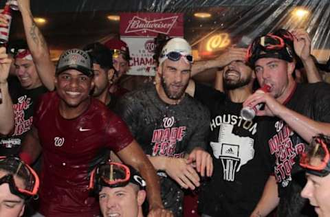 Sep 24, 2016; Pittsburgh, PA, USA; The Washington Nationals celebrate in the clubhouse after clinching the National League Eastern Division Championship by defeating the Pittsburgh Pirates at PNC Park. The Nationals won 6-1. Mandatory Credit: Charles LeClaire-USA TODAY Sports