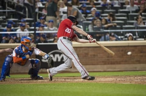 Sep 4, 2016; New York City, NY, USA; Washington Nationals second baseman Daniel Murphy (20) hits a single during the sixth inning of the game against the New York Mets at Citi Field. Mandatory Credit: Gregory J. Fisher-USA TODAY Sports