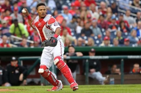 Oct 1, 2016; Washington, DC, USA; Washington Nationals catcher Pedro Severino (29) makes a throw to first base against the Miami Marlins in the seventh inning at Nationals Park. The Nationals won 2-1. Mandatory Credit: Geoff Burke-USA TODAY Sports