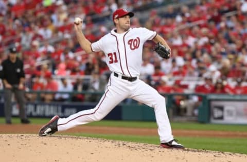 Oct 7, 2016; Washington, DC, USA; Washington Nationals starting pitcher Max Scherzer (31) throws against the Los Angeles Dodgers in the third inning during game one of the 2016 NLDS playoff baseball series at Nationals Park. Mandatory Credit: Geoff Burke-USA TODAY Sports