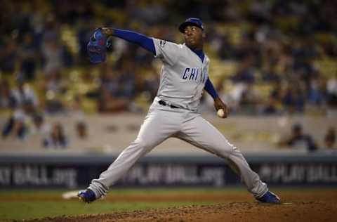 Oct 20, 2016; Los Angeles, CA, USA; Chicago Cubs relief pitcher Aroldis Chapman (54) delivers a pitch in the ninth inning against the Los Angeles Dodgers in game five of the 2016 NLCS playoff baseball series against the Los Angeles Dodgers at Dodger Stadium. Mandatory Credit: Kelvin Kuo-USA TODAY Sports