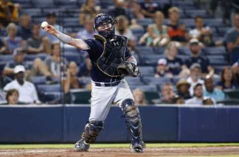 Aug 30, 2016; Atlanta, GA, USA; San Diego Padres catcher Derek Norris (3) throws a runner out at first against the Atlanta Braves in the eighth inning at Turner Field. Mandatory Credit: Brett Davis-USA TODAY Sports