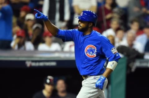 Nov 2, 2016; Cleveland, OH, USA; Chicago Cubs center fielder Dexter Fowler celebrates after hitting a solo home run against the Cleveland Indians in the first inning in game seven of the 2016 World Series at Progressive Field. Mandatory Credit: Tommy Gilligan-USA TODAY Sports