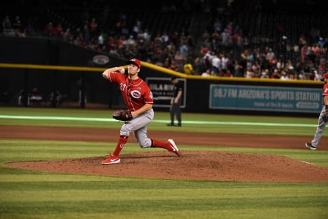 PHOENIX, ARIZONA – SEPTEMBER 15: Trevor Bauer #27 of the Cincinnati Reds takes a running warm up pitch against the Arizona Diamondbacks at Chase Field on September 15, 2019 in Phoenix, Arizona. (Photo by Norm Hall/Getty Images)