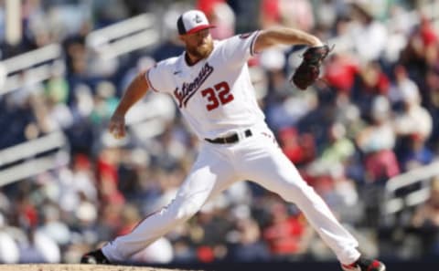 Aaron Barrett #32 of the Washington Nationals delivers a pitch against the Houston Astros in the fourth inning of a Grapefruit League spring training game at FITTEAM Ballpark of The Palm Beaches on February 23, 2020 in West Palm Beach, Florida. (Photo by Michael Reaves/Getty Images)