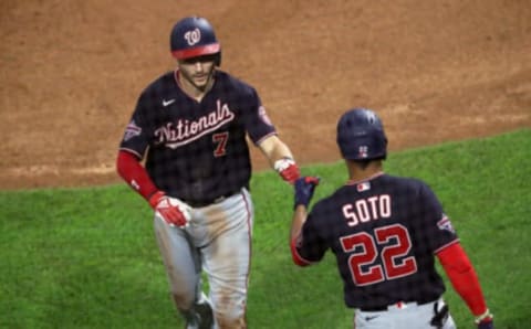 Trea Turner #7 of the Washington Nationals is congratulated by Juan Soto #22 after hitting a solo home run in the seventh inning during a game against the Philadelphia Phillies at Citizens Bank Park on August 31, 2020 in Philadelphia, Pennsylvania. The Phillies won 8-6. (Photo by Hunter Martin/Getty Images)