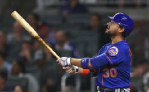 ATLANTA, GA – OCTOBER 02: Michael Conforto #30 of the New York Mets watches after hitting a ball deep for a home run during the eighth inning of the game against the Atlanta Braves at Truist Park on October 2, 2021 in Atlanta, Georgia. (Photo by Todd Kirkland/Getty Images)