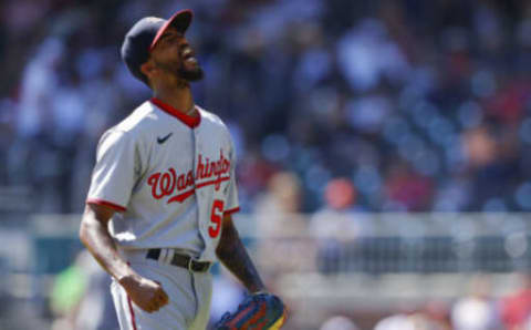 ATLANTA, GA – SEPTEMBER 21: Carl Edwards Jr. #58 of the Washington Nationals reacts after getting out of the eighth inning against the Atlanta Braves at Truist Park on September 21, 2022 in Atlanta, Georgia. (Photo by Todd Kirkland/Getty Images)