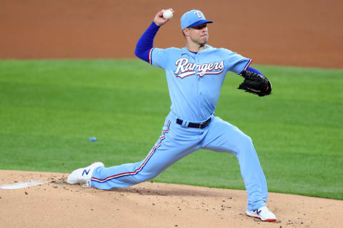 ARLINGTON, TEXAS – JULY 26: Corey Kluber (28) of the Texas Rangers pitches against the Colorado Rockies in the top of the first inning at Globe Life Field on July 26, 2020 in Arlington, Texas. (Photo by Tom Pennington/Getty Images)