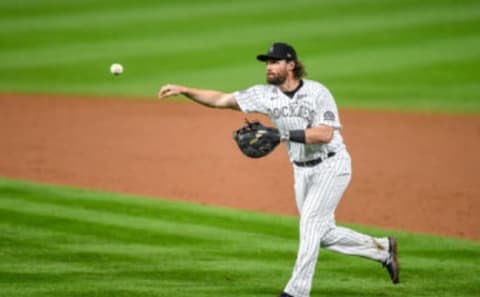 Daniel Murphy #42 of the Colorado Rockies makes a play against the San Diego Padres at Coors Field on August 28, 2020 in Denver, Colorado. All players are wearing #42 in honor of Jackie Robinson Day. The day honoring Jackie Robinson, traditionally held on April 15, was rescheduled due to the COVID-19 pandemic. (Photo by Dustin Bradford/Getty Images)