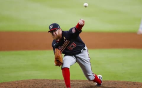 Sean Doolittle #63 of the Washington Nationals pitches in the eighth inning of an MLB game against the Atlanta Braves at Truist Park on September 5, 2020 in Atlanta, Georgia. (Photo by Todd Kirkland/Getty Images)