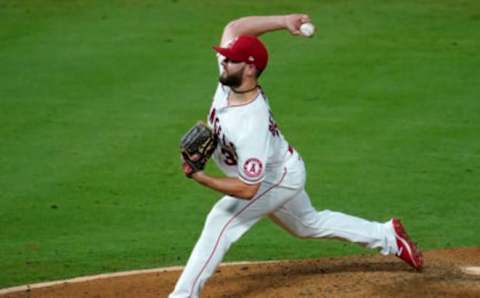 Cam Bedrosian #32 of the Los Angeles Angels pitches against the Arizona Diamondbacks at Angel Stadium of Anaheim on September 15, 2020 in Anaheim, California. (Photo by John McCoy/Getty Images)