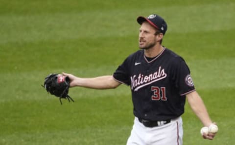 Max Scherzer #31 of the Washington Nationals reacts after hearing that the game against the New York Mets had been postponed due to inclement weather at Nationals Park on September 25, 2020 in Washington, DC. (Photo by Patrick McDermott/Getty Images)