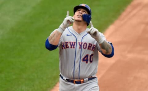 Wilson Ramos #40 of the New York Mets celebrates after hitting a two-run home run in the third inning against the Washington Nationals during game 1 of a double header at Nationals Park on September 26, 2020 in Washington, DC. (Photo by G Fiume/Getty Images)