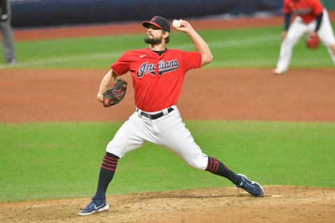 Closing pitcher Brad Hand #33 of the Cleveland Indians pitches during the ninth inning of Game Two of the American League Wild Card Series against the New York Yankees at Progressive Field on September 30, 2020, in Cleveland, Ohio. The Yankees defeated the Indians 10-9. (Photo by Jason Miller/Getty Images)