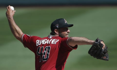 SCOTTSDALE, ARIZONA – MARCH 04: Starting pitcher Madison Bumgarner #40 of the Arizona Diamondbacks throws against the Los Angeles Angels during the second inning of the MLB spring training baseball game at Salt River Fields at Talking Stick on March 04, 2021 in Scottsdale, Arizona. (Photo by Ralph Freso/Getty Images)