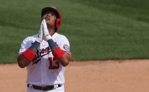 Starlin Castro #13 of the Washington Nationals reacts after hitting a double against the Atlanta Braves during the seventh inning in game one of a doubleheader at Nationals Park on April 7, 2021 in Washington, DC. (Photo by Patrick Smith/Getty Images)