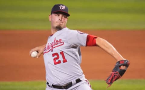 Tanner Rainey #21 of the Washington Nationals delivers a pitch against the Miami Marlins at loanDepot park on June 27, 2021 in Miami, Florida. (Photo by Mark Brown/Getty Images)