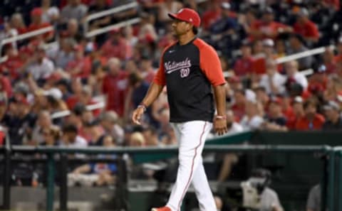 Manager Dave Martinez #4 of the Washington Nationals walks on the field for a pitching change against the New York Mets at Nationals Park on June 28, 2021 in Washington, DC. (Photo by Will Newton/Getty Images)