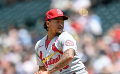 Carlos Martinez #18 of the St. Louis Cardinals pitches against the Colorado Rockies during a game at Coors Field on July 4, 2021 in Denver, Colorado. (Photo by Dustin Bradford/Getty Images)